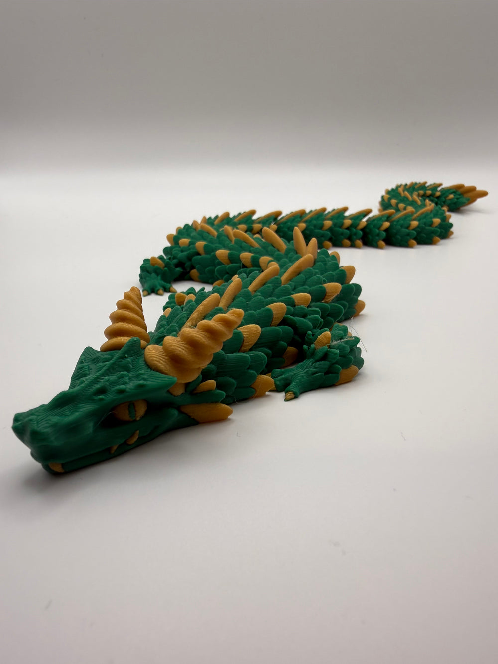 Longhorn Dragon Flexi – Forest & Gold, 3D printed by 3D&ME in Tralee