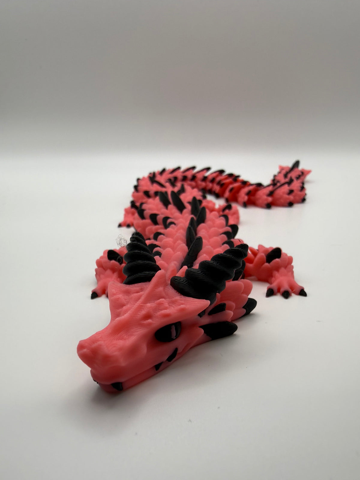 Longhorn Dragon Flexi – Rose & Black, 3D printed by 3D&ME in Tralee