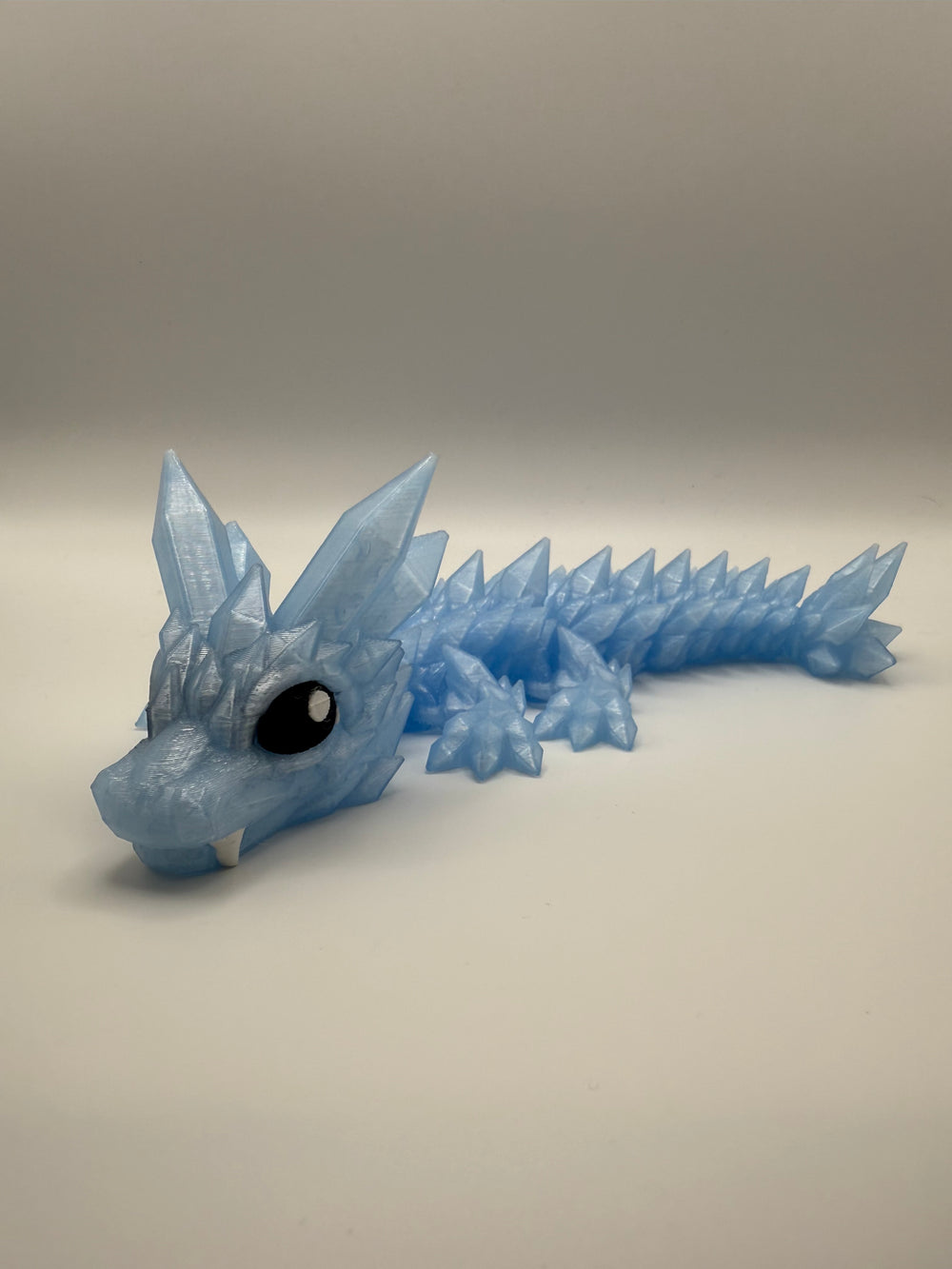 Crystal Cutie Dragon Flexi – Ice Blue, 3D printed by 3D&ME in Tralee