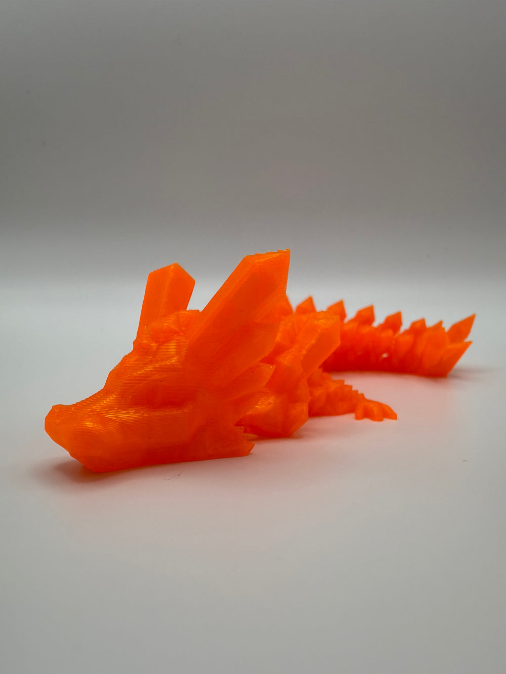 Faceted Crystal Dragon Flexi – Orange, 3D printed by 3D&ME in Tralee