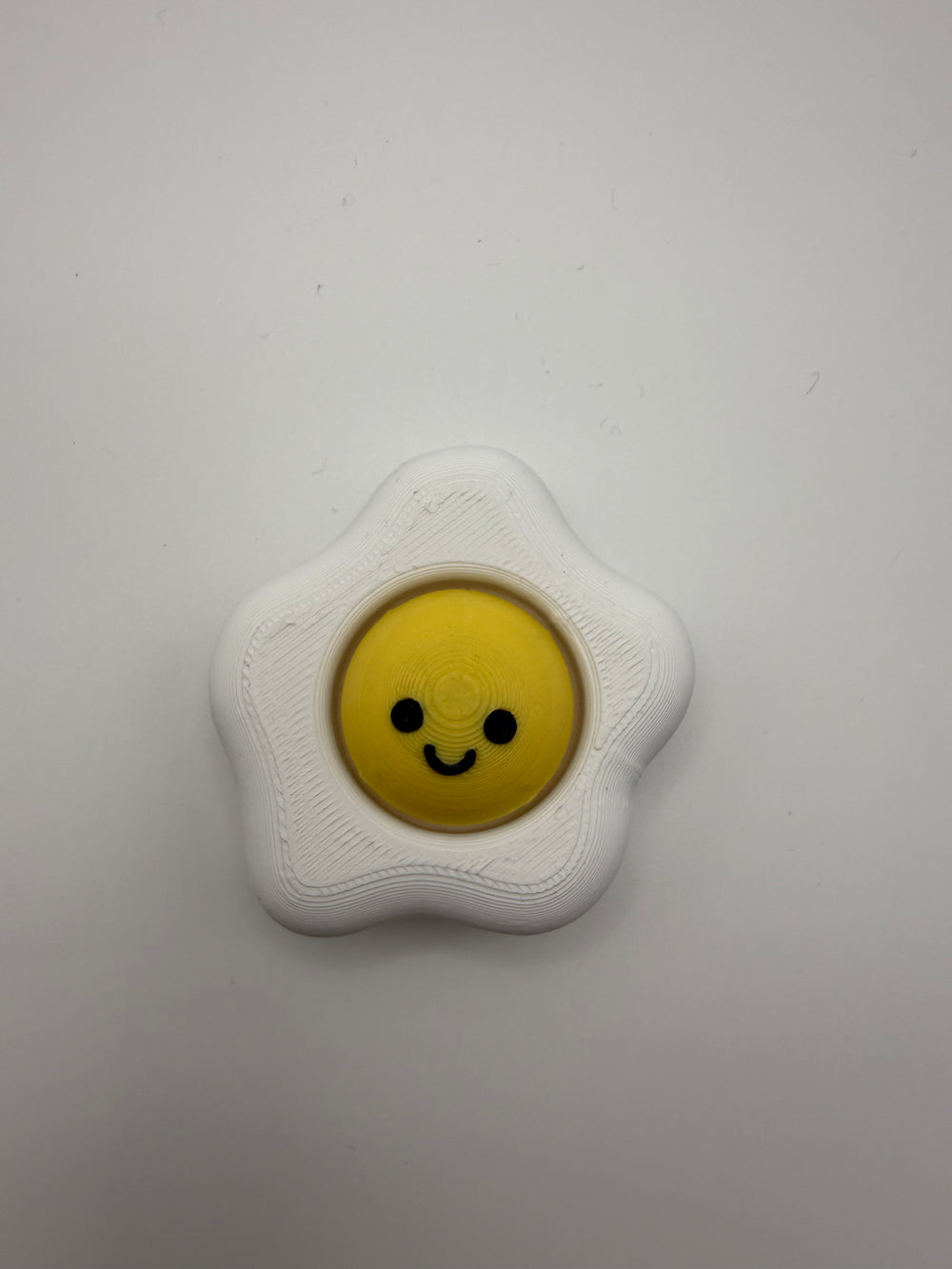 Fried Egg Fidget Clicker – White & Yellow, 3D printed by 3D&ME in Tralee