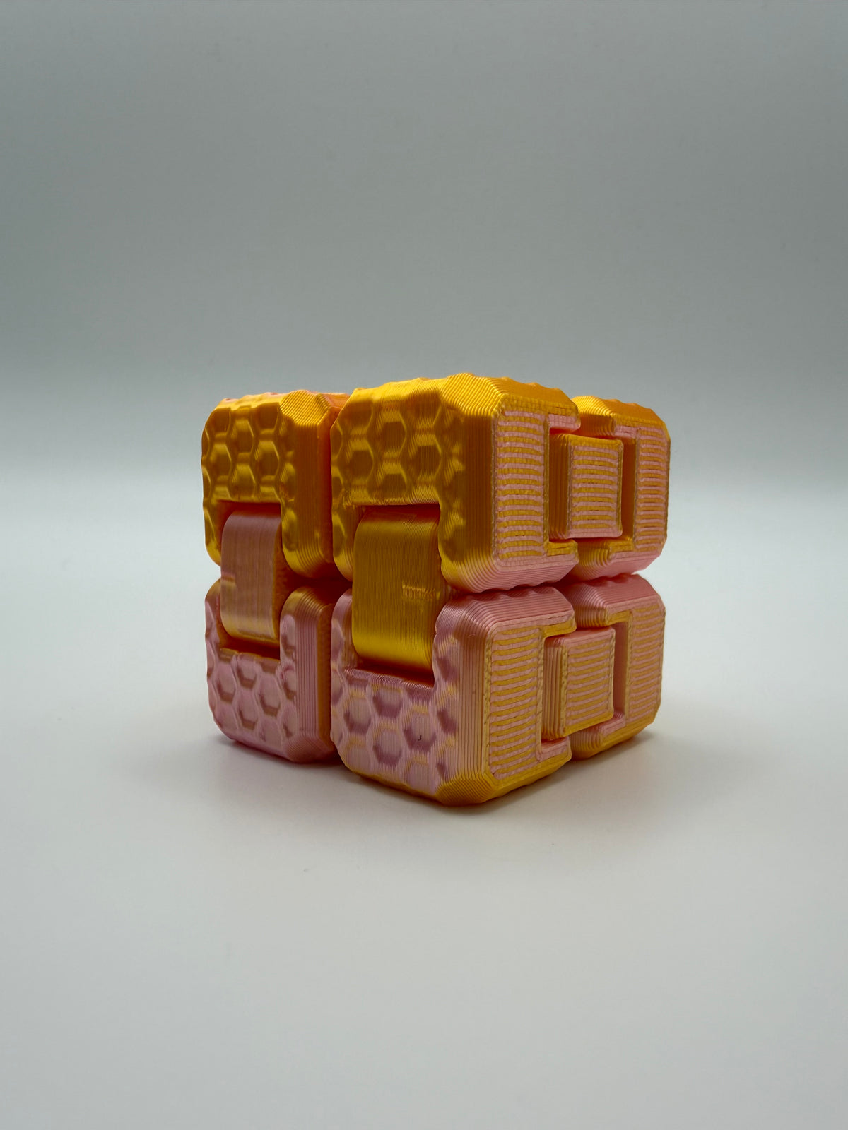 Infinity Cube Fidget – Honeycomb – Honey & Blush, 3D printed by 3D&ME in Tralee