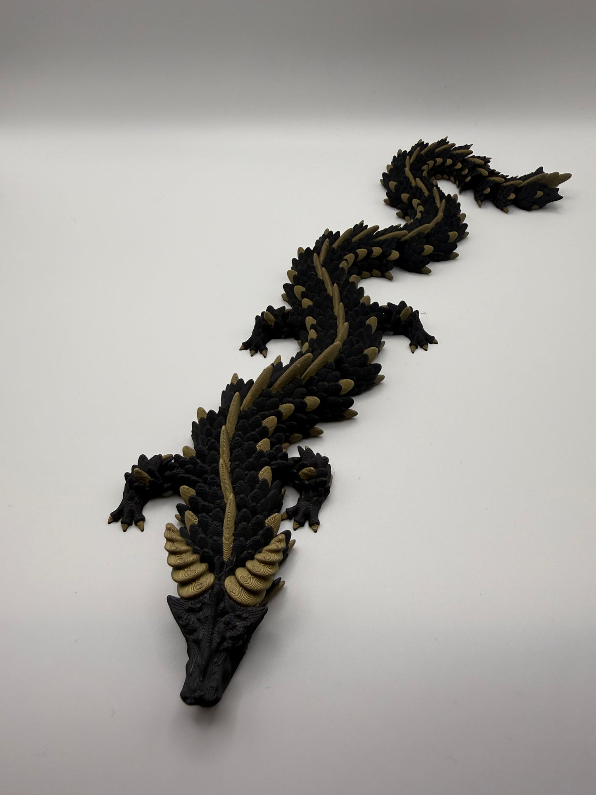 Longhorn Dragon Flexi – Black & Gold, 3D printed by 3D&ME in Tralee