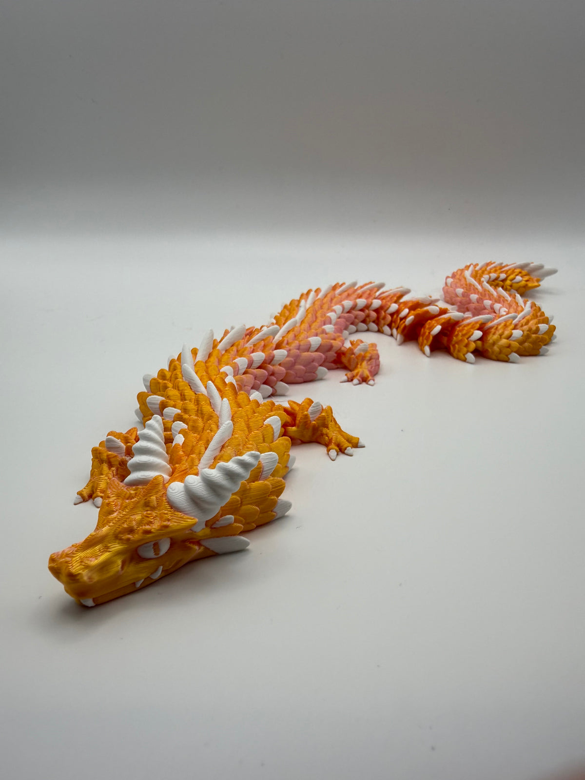 Longhorn Dragon Flexi – Sunset Gold, 3D printed by 3D&ME in Tralee