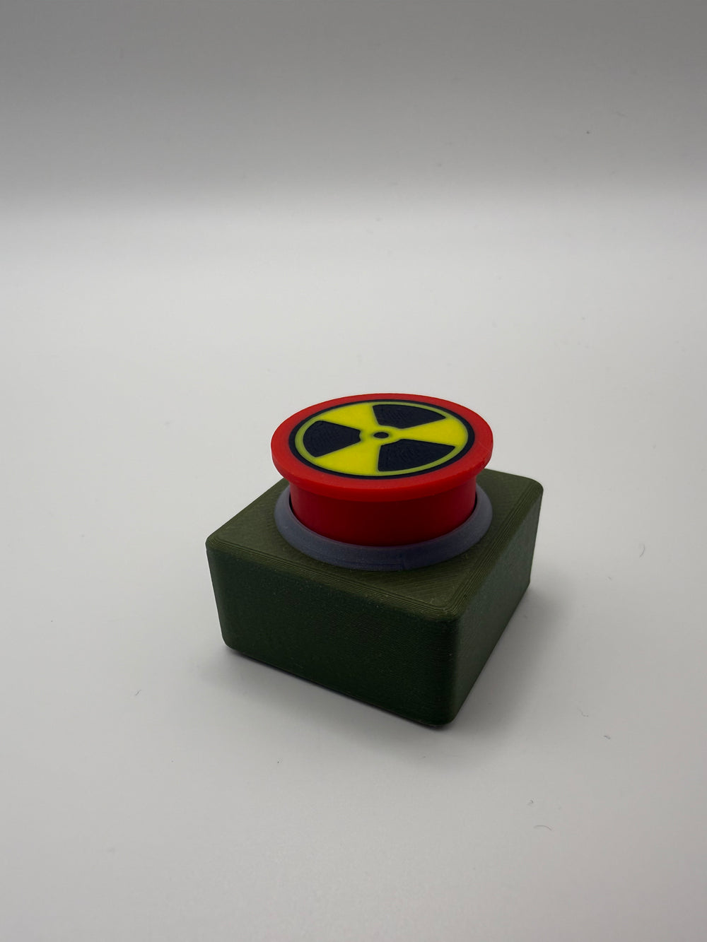 Nuke Button Fidget Clicker – Olive & Red, 3D printed by 3D&ME in Tralee