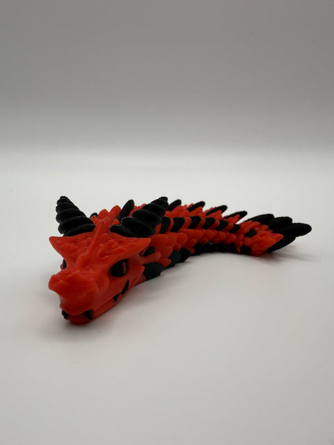 Small Dragon Flexi – Red & Black, 3D printed by 3D&ME in Tralee