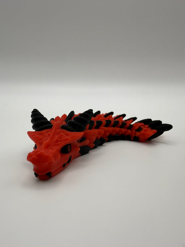 Small Dragon Flexi – Red & Black, 3D printed by 3D&ME in Tralee