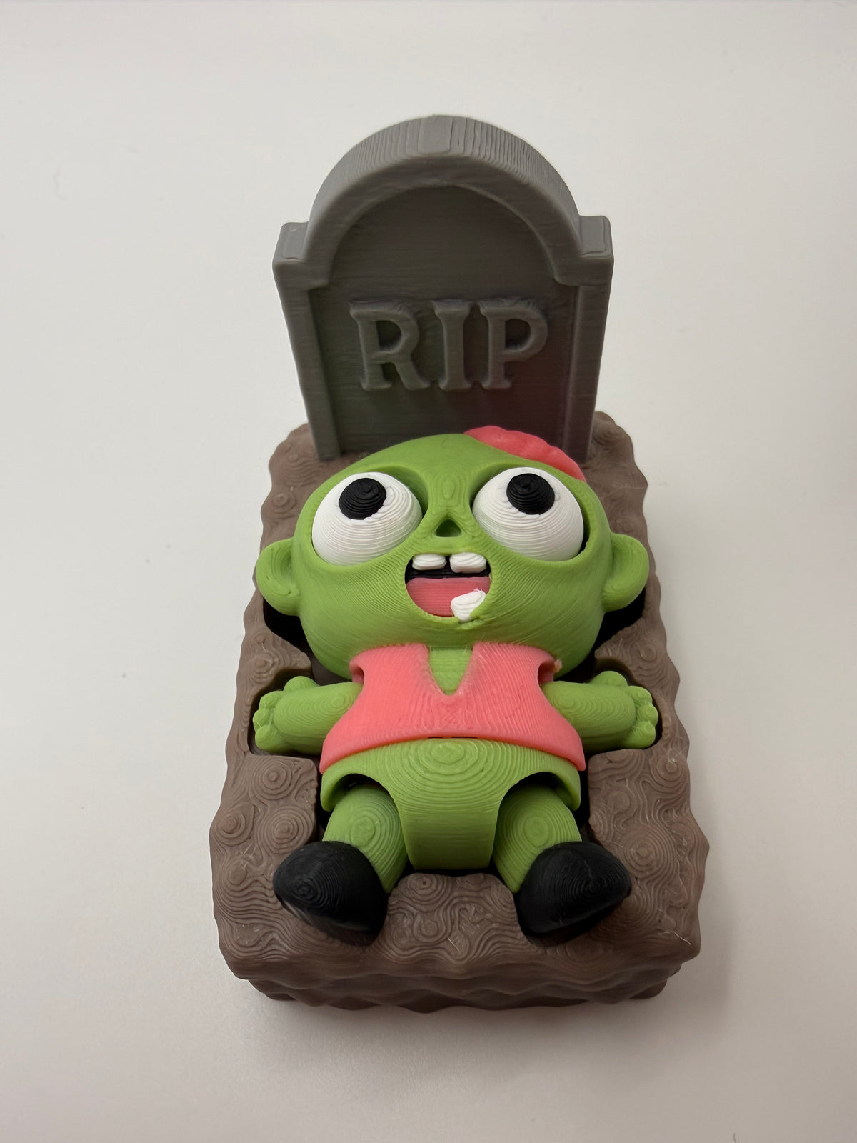Zombie in Grave Fidget Clicker – Green, 3D printed by 3D&ME in Tralee